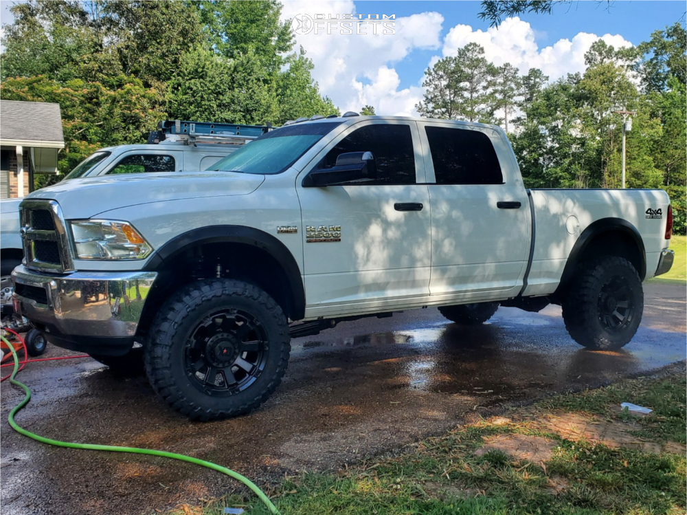 2018 Ram 2500 with 20x10 -18 XD XD852 and 35/12.5R20 Toyo Tires