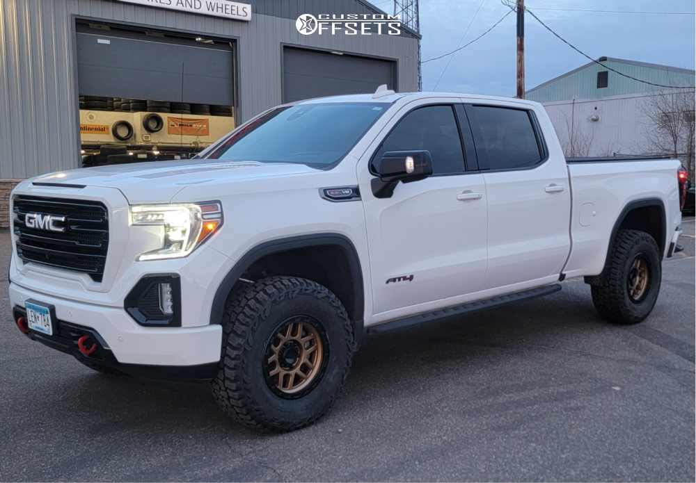 2020 GMC Sierra 1500 with 17x8.5 0 KMC Km544 and 315/70R17 Mickey