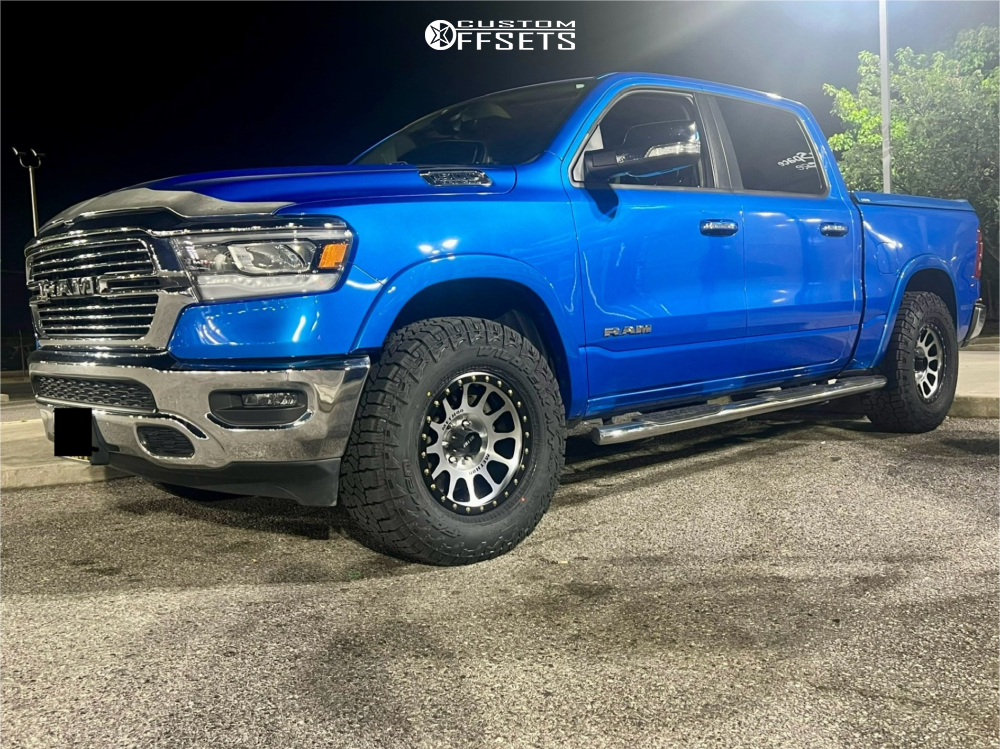 2020 Ram 1500 with 18x9 -12 Method MR305 and 295/70R18 Falken