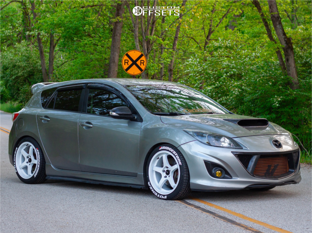 2010 Mazda 3 with 18x8.5 35 AVID1 Av28 and 235/40R18 Bridgestone