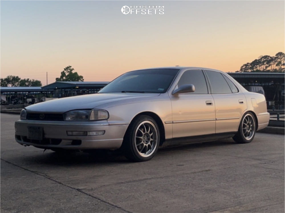 1994 Toyota Camry with 16x7 38 Enkei J10 and 205/45R16 Falken Ziex