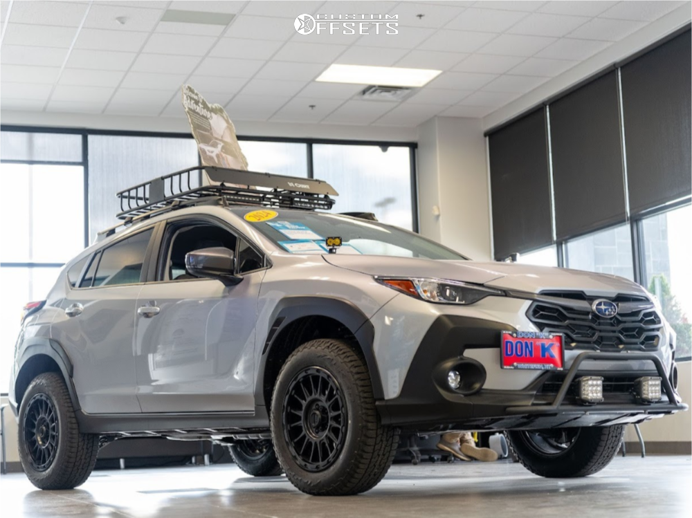 2024 Subaru Crosstrek with 17x8 35 KMC Km542 and 225/65R17 Falken