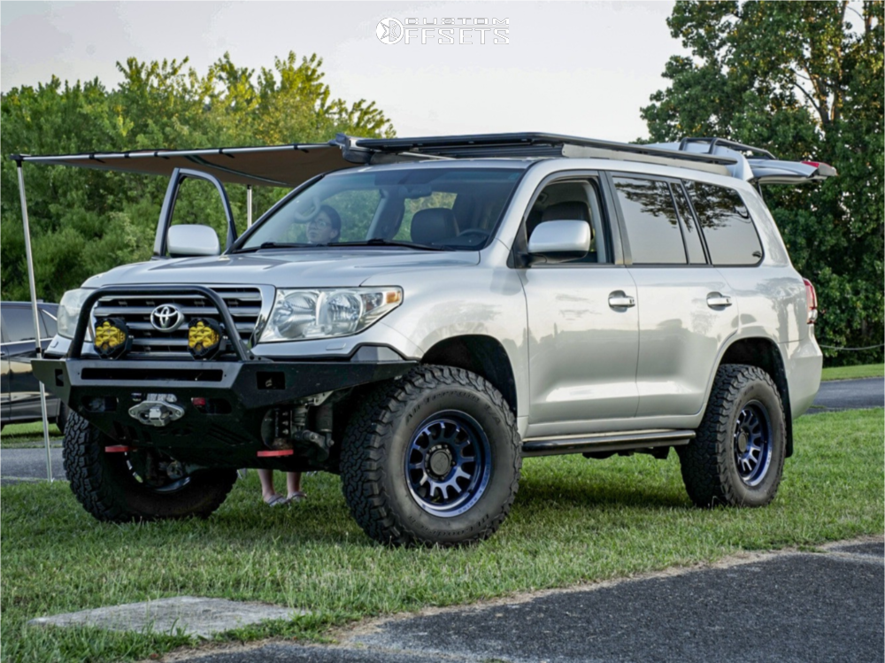 2009 Toyota Land Cruiser with 17x8.5 10 Black Rhino Rapid and 285